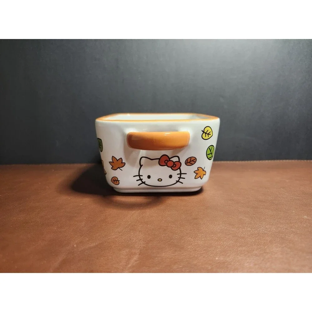 Hello Kitty fall-themed mini loaf pan featuring autumn leaves and vibrant orange
